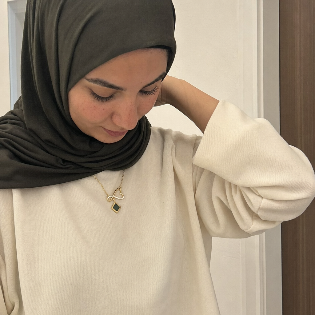Customer wearing Zayyan jewelry